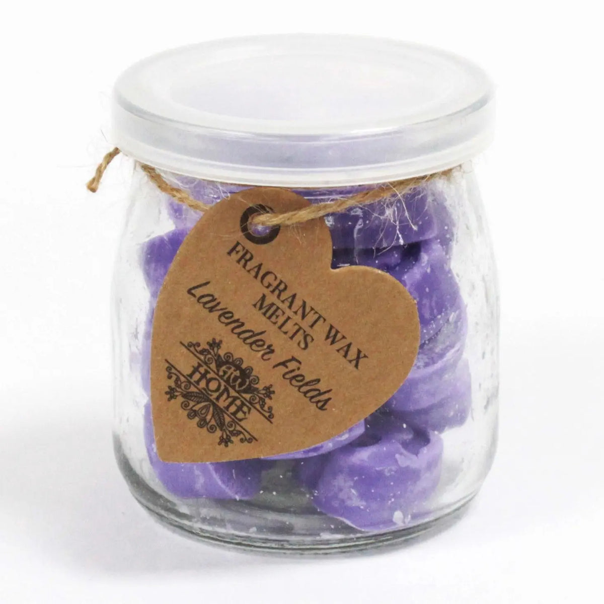 Frasco de vidrio con tapa, relleno de pastillas de cera aromática color lavanda y etiqueta de cartón con forma.
