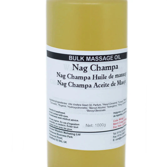 Botella cilíndrica de 1kg con aceite de masaje color amarillo dorado y etiqueta informativa sobre fondo blanco.