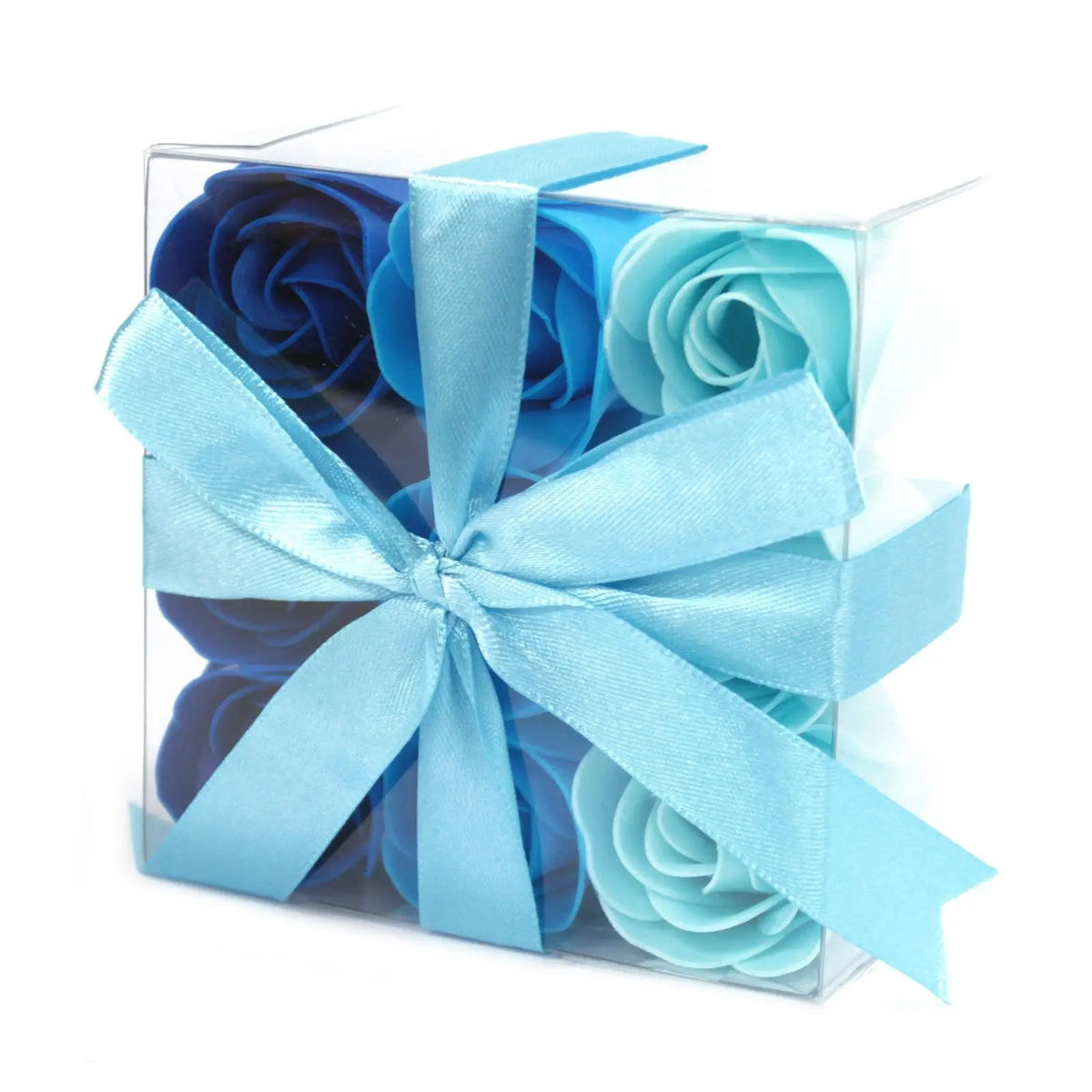 Set de 9 rosas de jabón Ornare Living en tonos azules, dentro de caja transparente decorada con un lazo de raso.