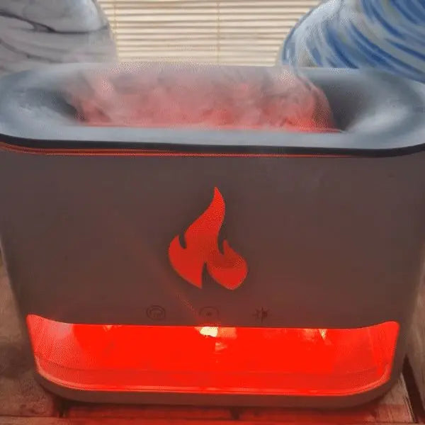 Difusor Blaze gris con efecto llama roja, cámara de sal del Himalaya iluminada y salida de vapor superior.