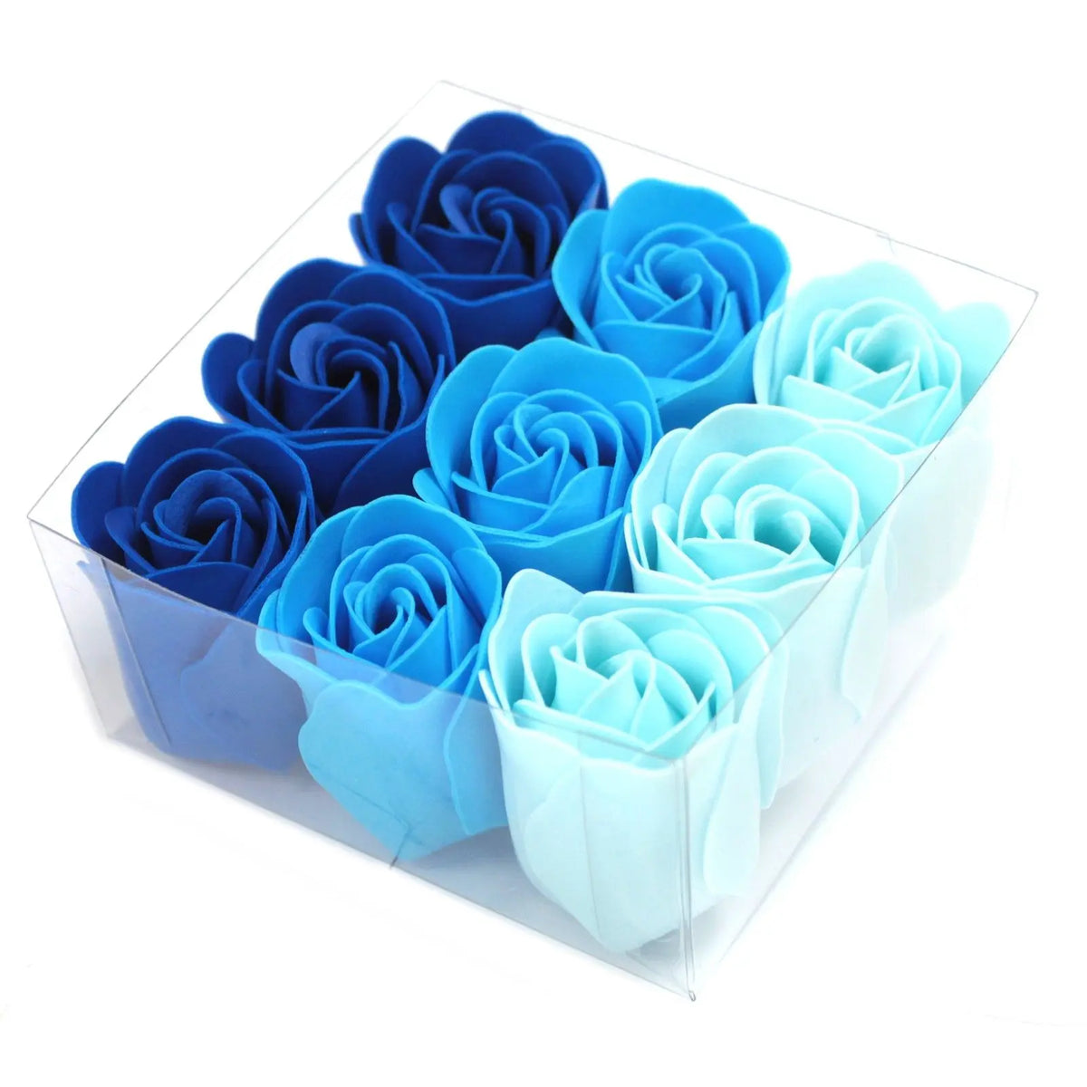 Set de 9 rosas de jabón Ornare Living en tonos degradados de azul, presentadas en una caja cuadrada transparente.