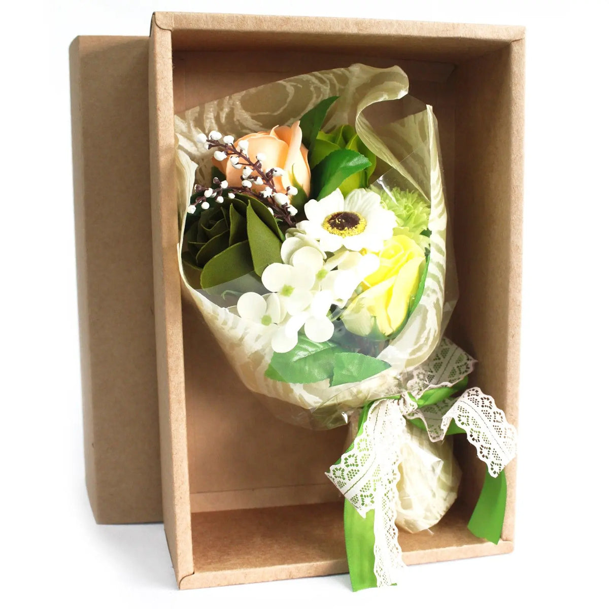 Bouquet de flores de jabón multicolores con lazo decorativo en caja de regalo de cartón kraft.