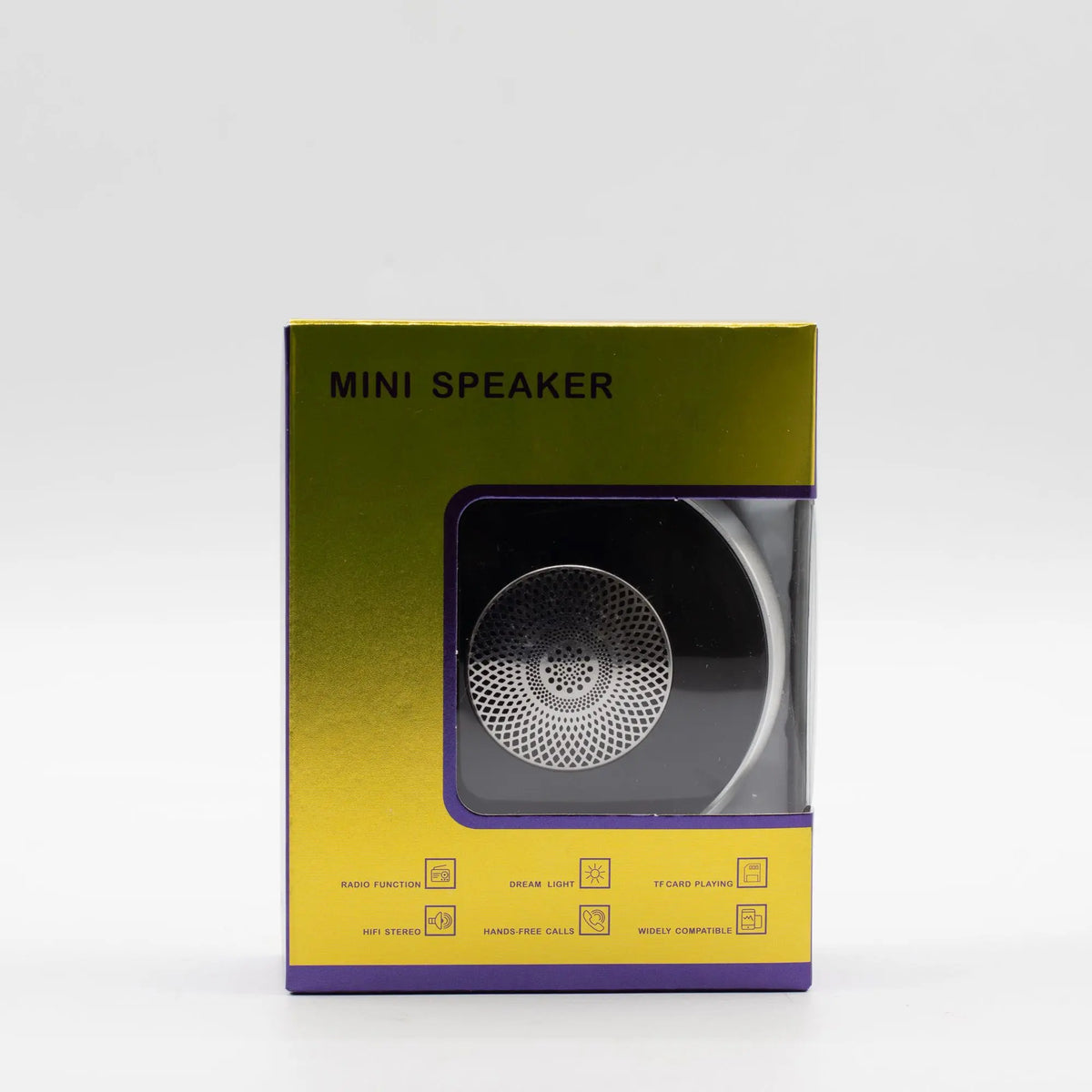 Altavoz Bluetooth mini, plateado y redondo con diseño mandala, dentro de caja dorada brillante. Marca Ancient Wisdom.