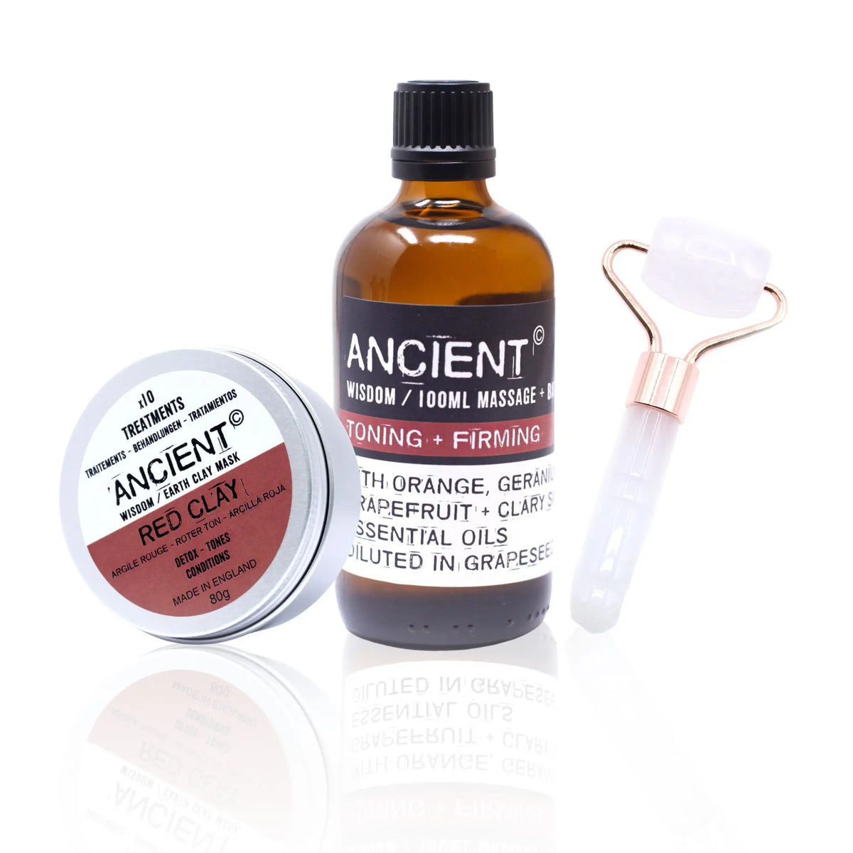 Set de regalo Ancient Wisdom: lata de arcilla roja, aceite corporal reafirmante y rodillo facial de cuarzo rosa.