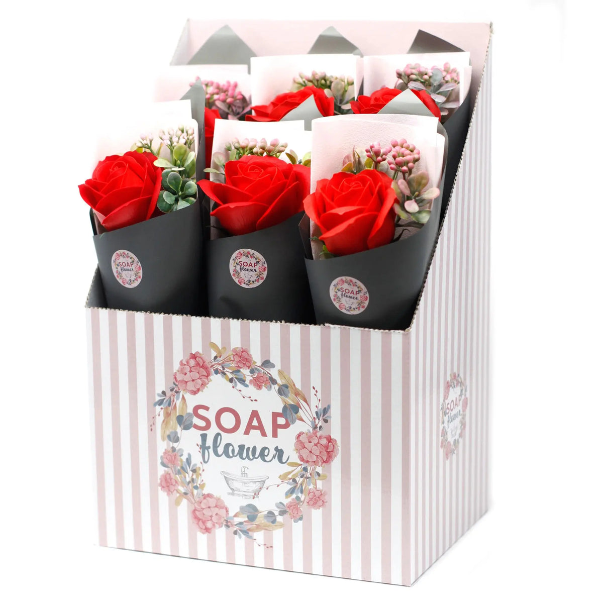 Expositor con ramos de rosas rojas de jabón envueltas en papel negro, decoradas con pequeñas flores artificiales.
