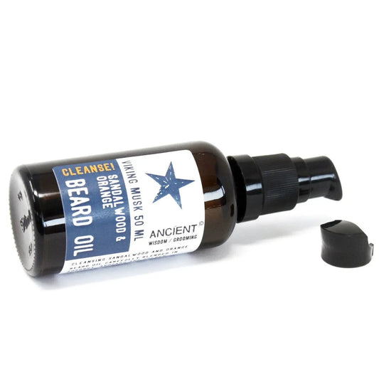 Frasco de vidrio ámbar de 50ml con dosificador negro y etiqueta blanca/azul de aceite para barba Ancient Wisdom.