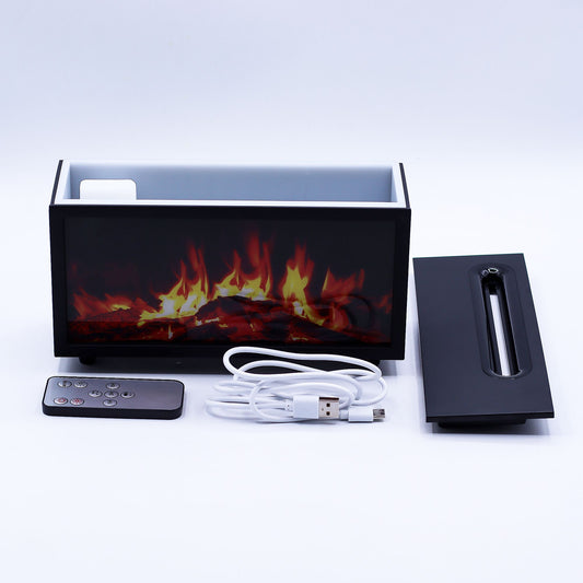 Difusor negro rectangular con efecto llama, mando a distancia, cable USB y tapa extraíble sobre fondo blanco.