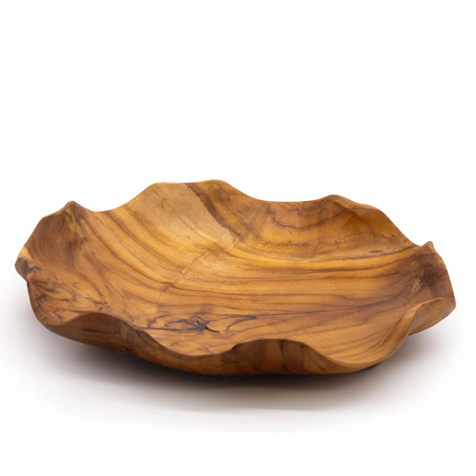 Frutero redondo de madera de teca con borde ondulado y vetas naturales, diseño artesanal sobre fondo blanco.