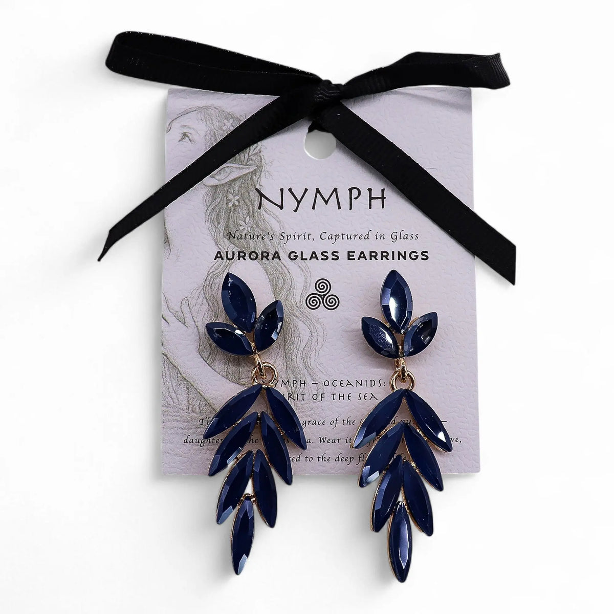 Pendientes largos colgantes con cristales azul royal en forma de hoja, montados sobre base dorada y detalle de lazo.