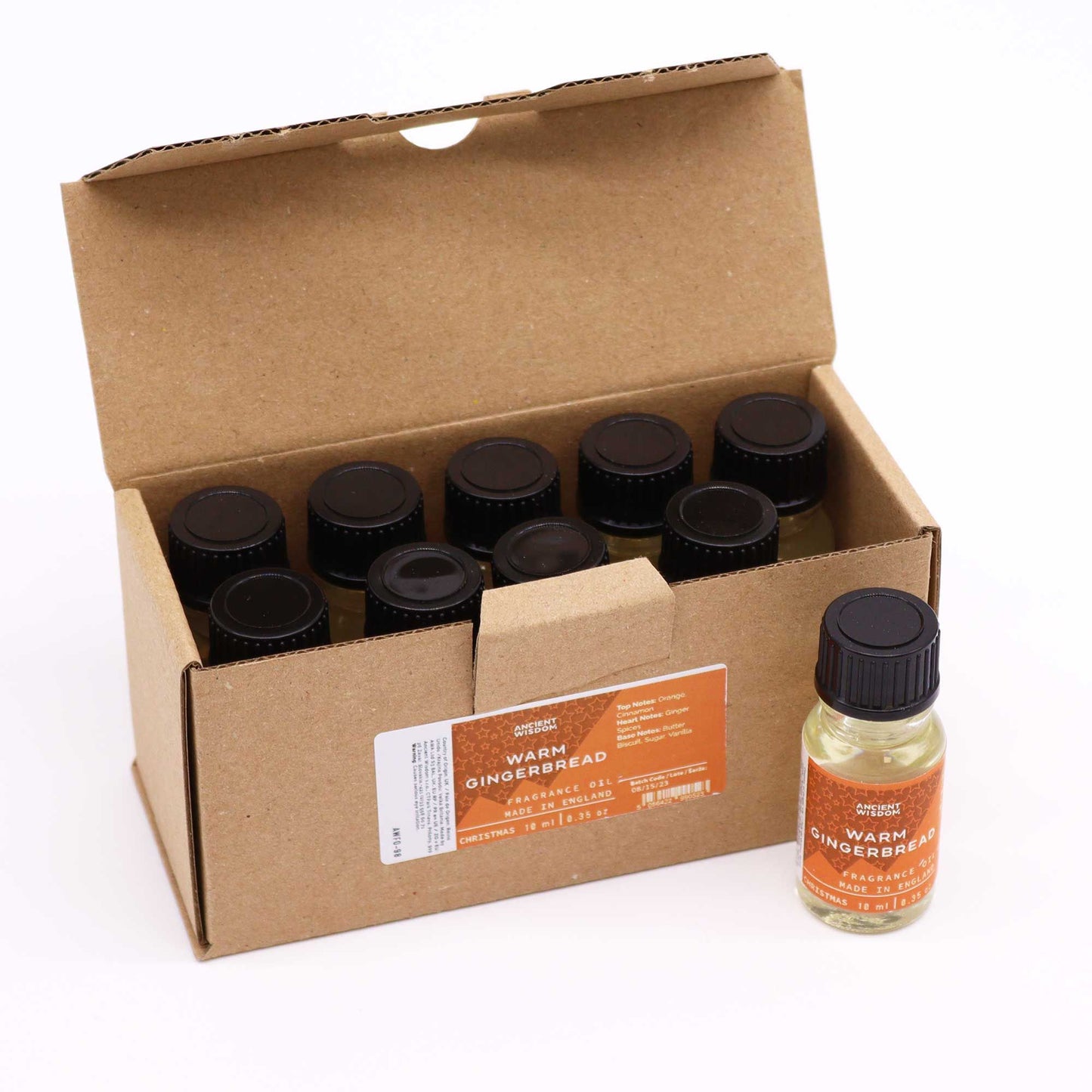 Caja de cartón con frascos de vidrio de 10 ml de aceite aromático de galleta de jengibre con tapón de rosca negro
