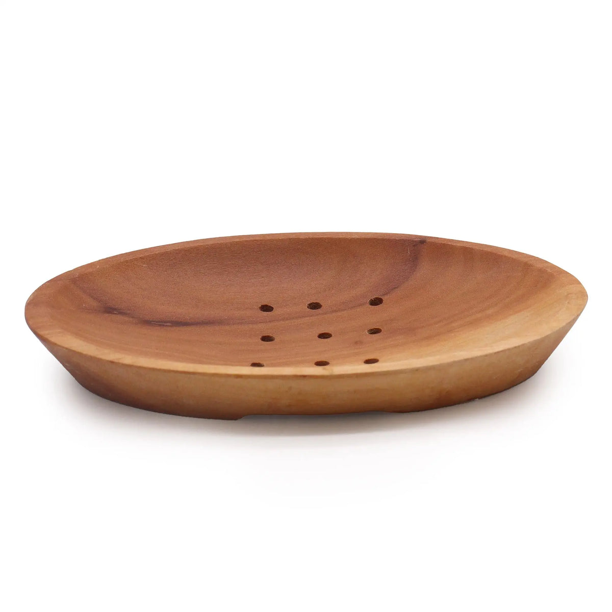 Jabonera ovalada de madera de caoba con tono marrón natural y orificios de drenaje. Diseño artesanal Ancient Wisdom.