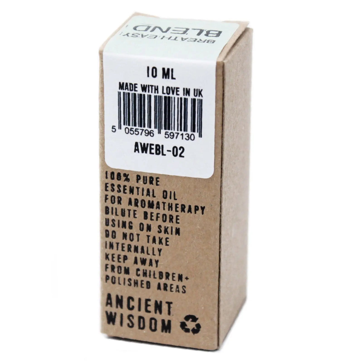 Caja pequeña de cartón marrón para aceite esencial, con etiquetas blancas de texto informativo y código de barras.