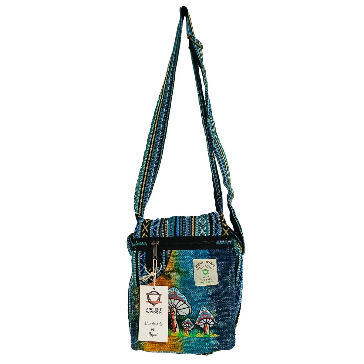 Bolso de hombro de cáñamo con estampado de hongos y tonos azules, estilo artesanal y ecológico con asa larga.
