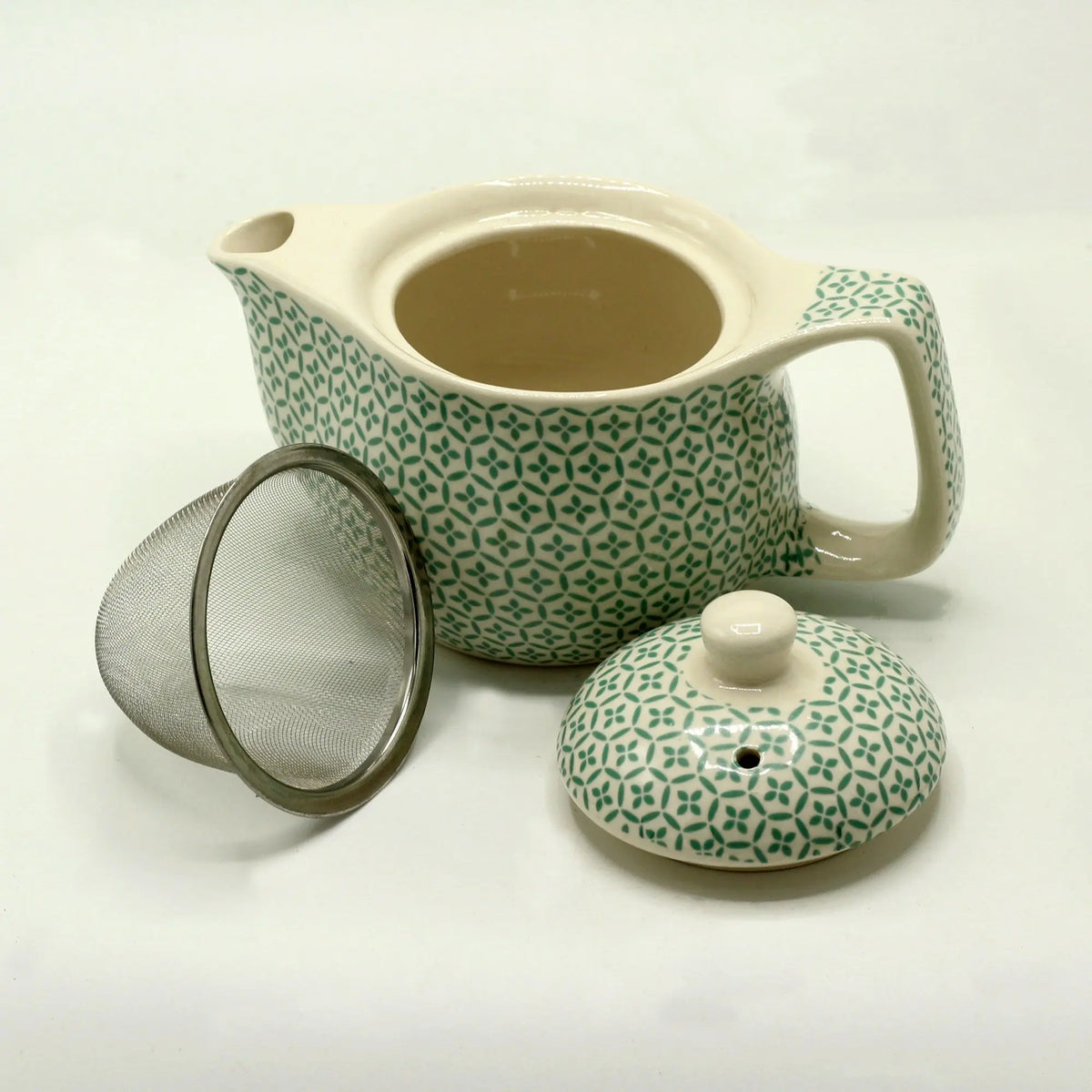 Tetera de cerámica 350ml con patrón de mosaico verde, incluye tapa y filtro de acero inoxidable.
