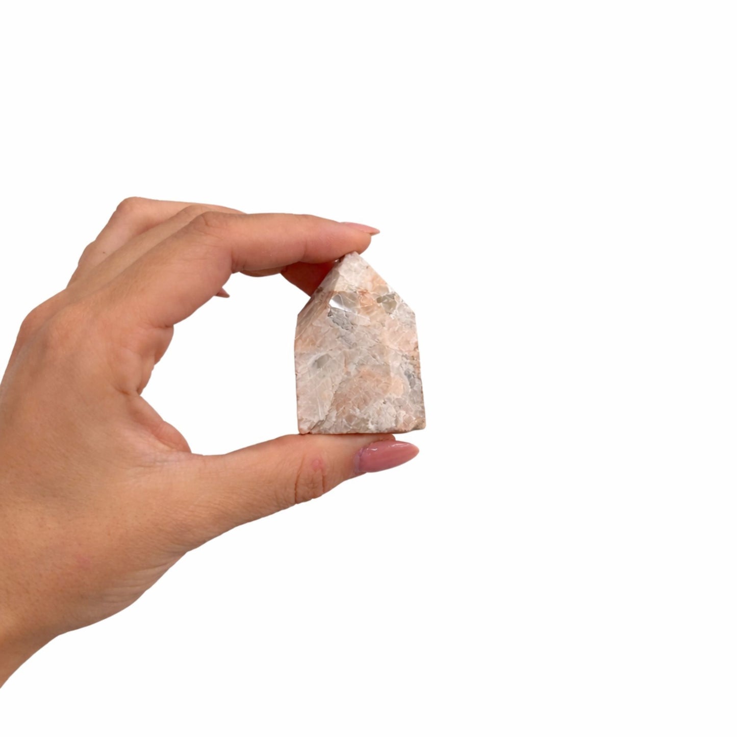 Piedra de cuarzo rosa, cristal natural en forma de casa, acabado pulido, ideal para decoración y energía positiva.