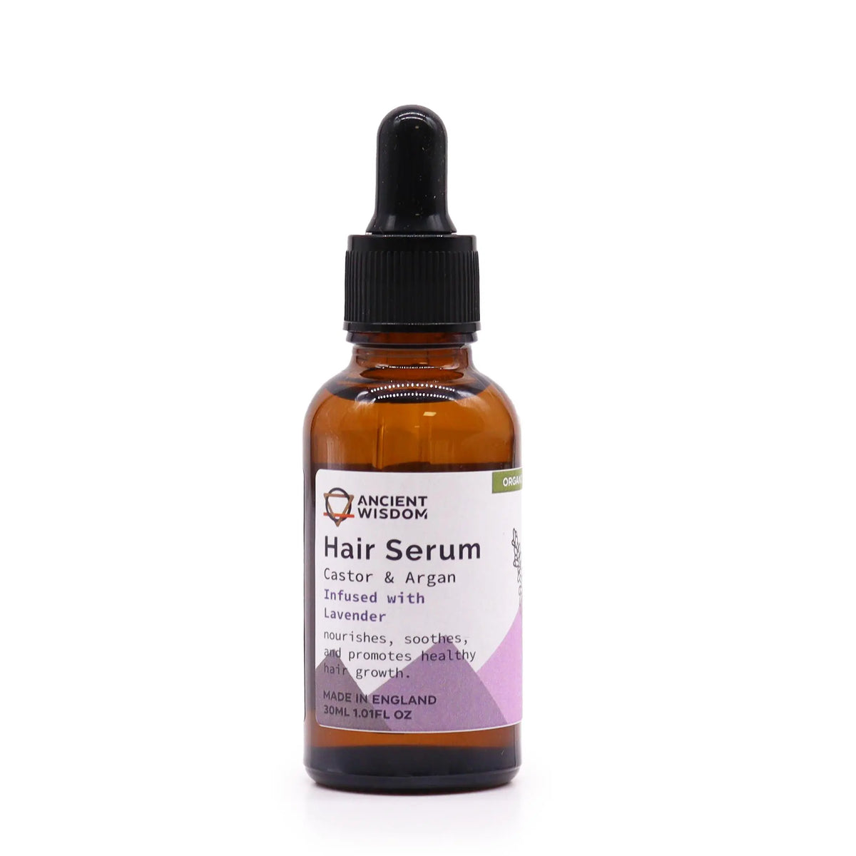 Frasco de vidrio ámbar de 30ml con gotero negro, conteniendo serum capilar de lavanda con etiqueta blanca y morada.