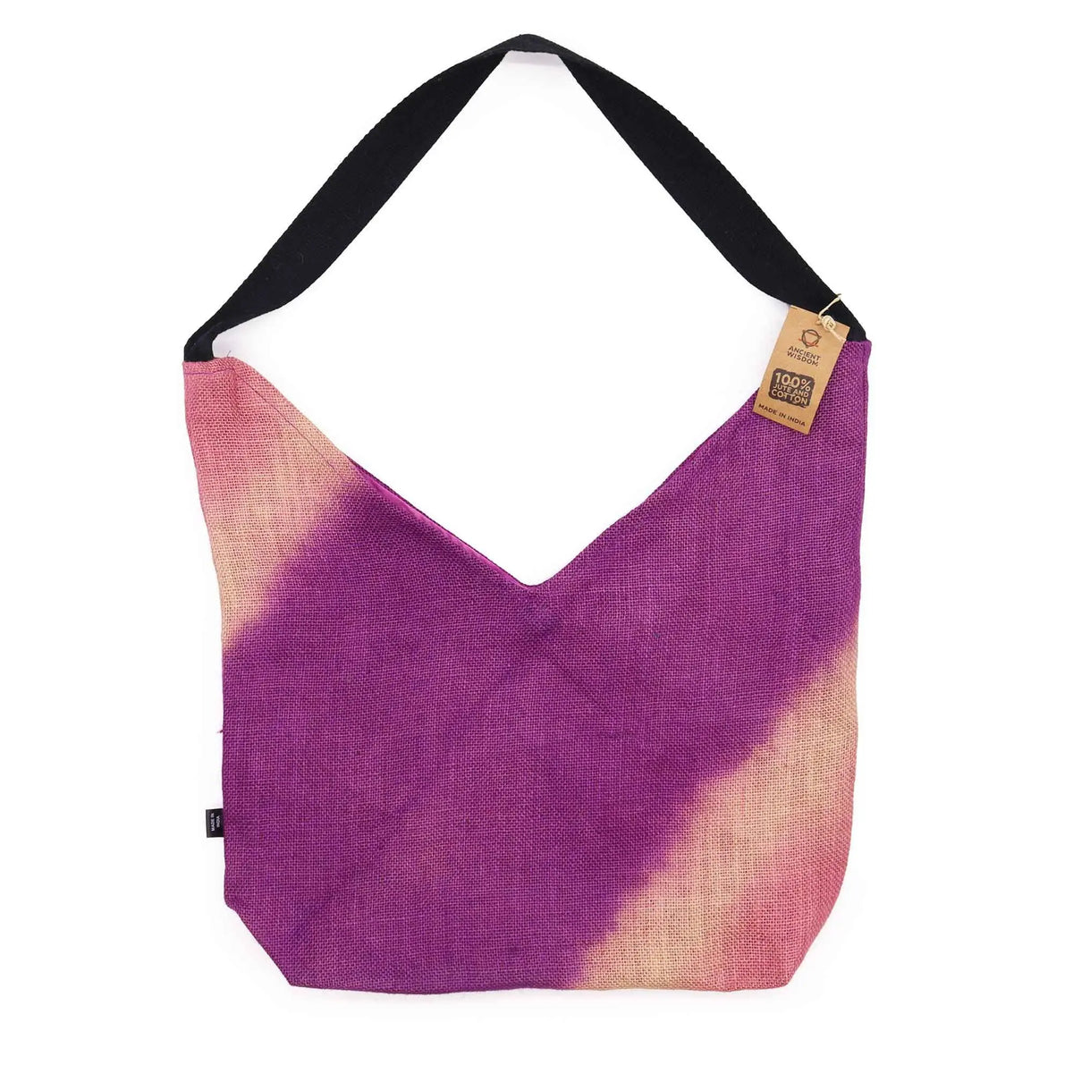 Bolso de hombro de tela estilo vintage en fucsia y beige, con asa negra y textura de tejido natural sobre fondo blanco.