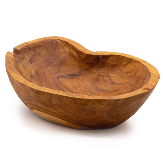 Frutero de madera de teca con forma irregular y orgánica que resalta el veteado natural y tono cálido del material