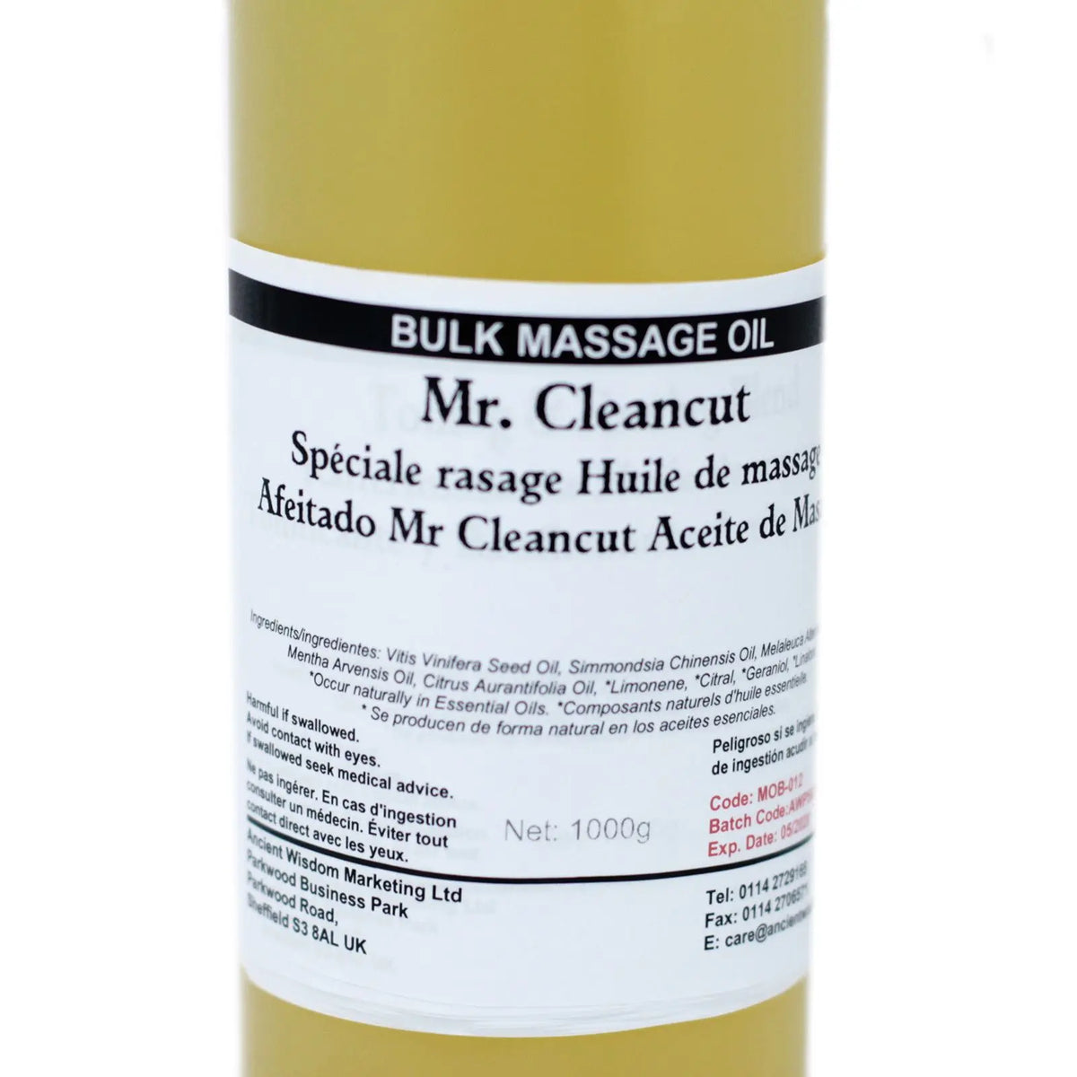 Botella de 1kg de aceite de masaje de color amarillo con etiqueta informativa sobre fondo blanco.