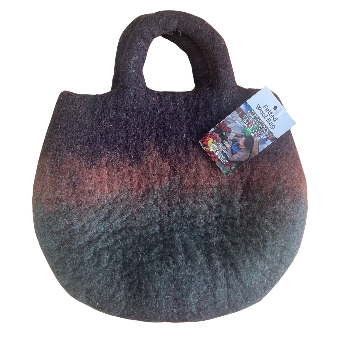 Bolsa de fieltro de lana redonda con degradado de colores oscuro, terracota y gris. Diseño artesanal con asa integrada.
