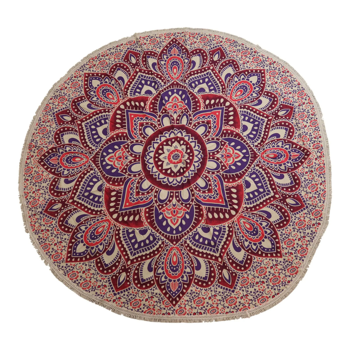 Tapiz redondo de algodón con diseño de mandala en tonos rosa y morado, decorado con flecos en el borde.