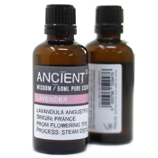 Dos frascos de vidrio ámbar de 50ml con tapa negra y etiqueta informativa sobre fondo blanco y rosa. Fondo blanco.
