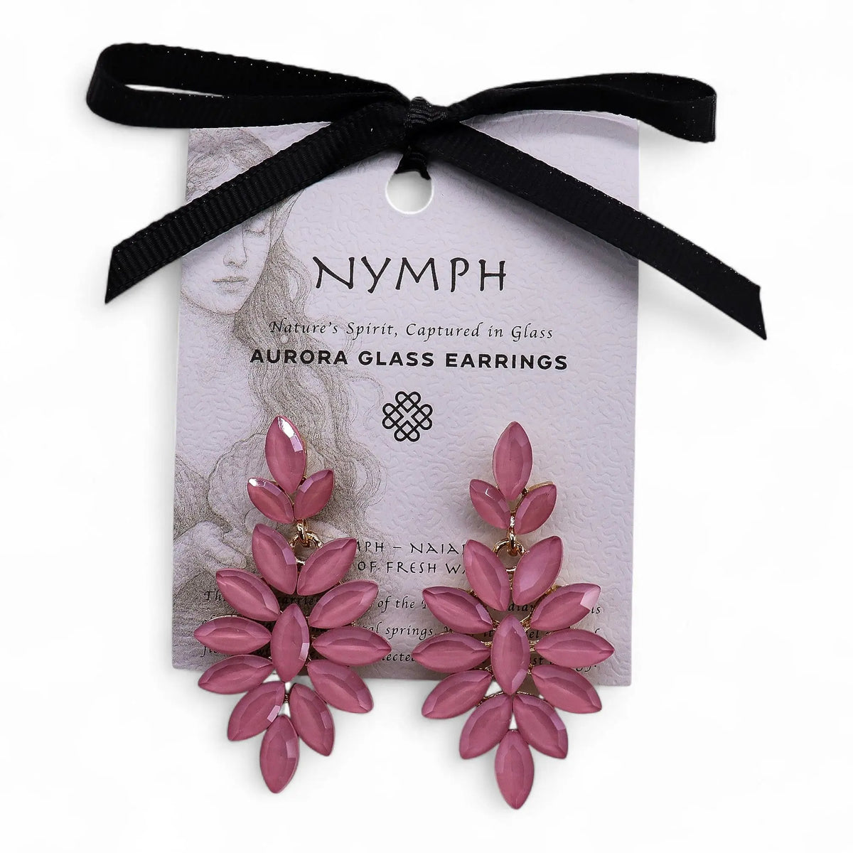 Pendientes colgantes en forma de flor con cristales rosa vintage, engarzados en metal dorado sobre tarjeta decorativa.