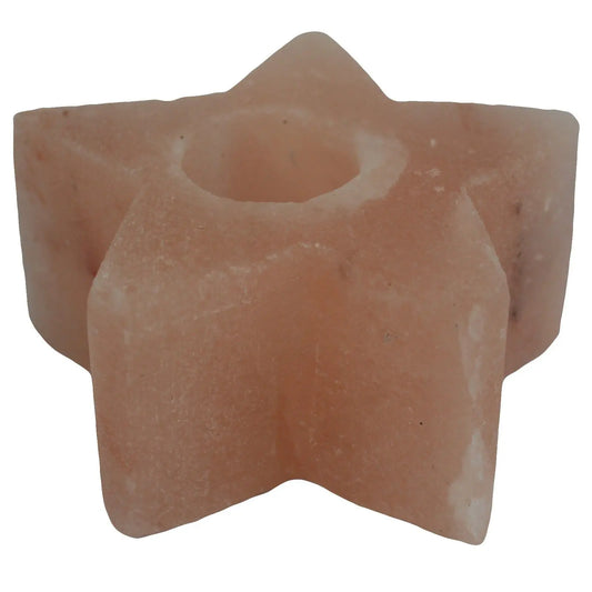 Portavelas de sal del Himalaya con forma de estrella, de color rosa pálido y textura rugosa. Fondo blanco.