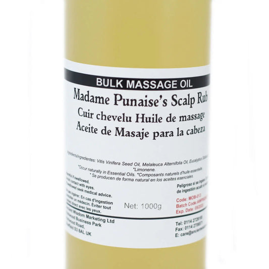 Botella de 1kg de aceite para cuero cabelludo con árbol de té y eucalipto. Etiqueta blanca con texto negro sobre fondo.