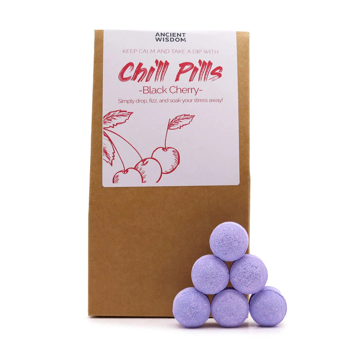 Pack de papel kraft con etiqueta de cerezas y 6 mini bombas de baño esféricas de color lila apiladas en pirámide.
