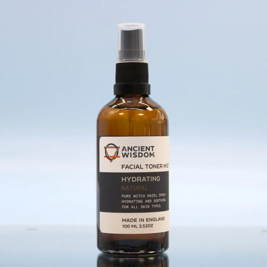 Frasco de vidrio ámbar de 100ml con atomizador negro, etiqueta blanca y negra de Ancient Wisdom para tónico facial.