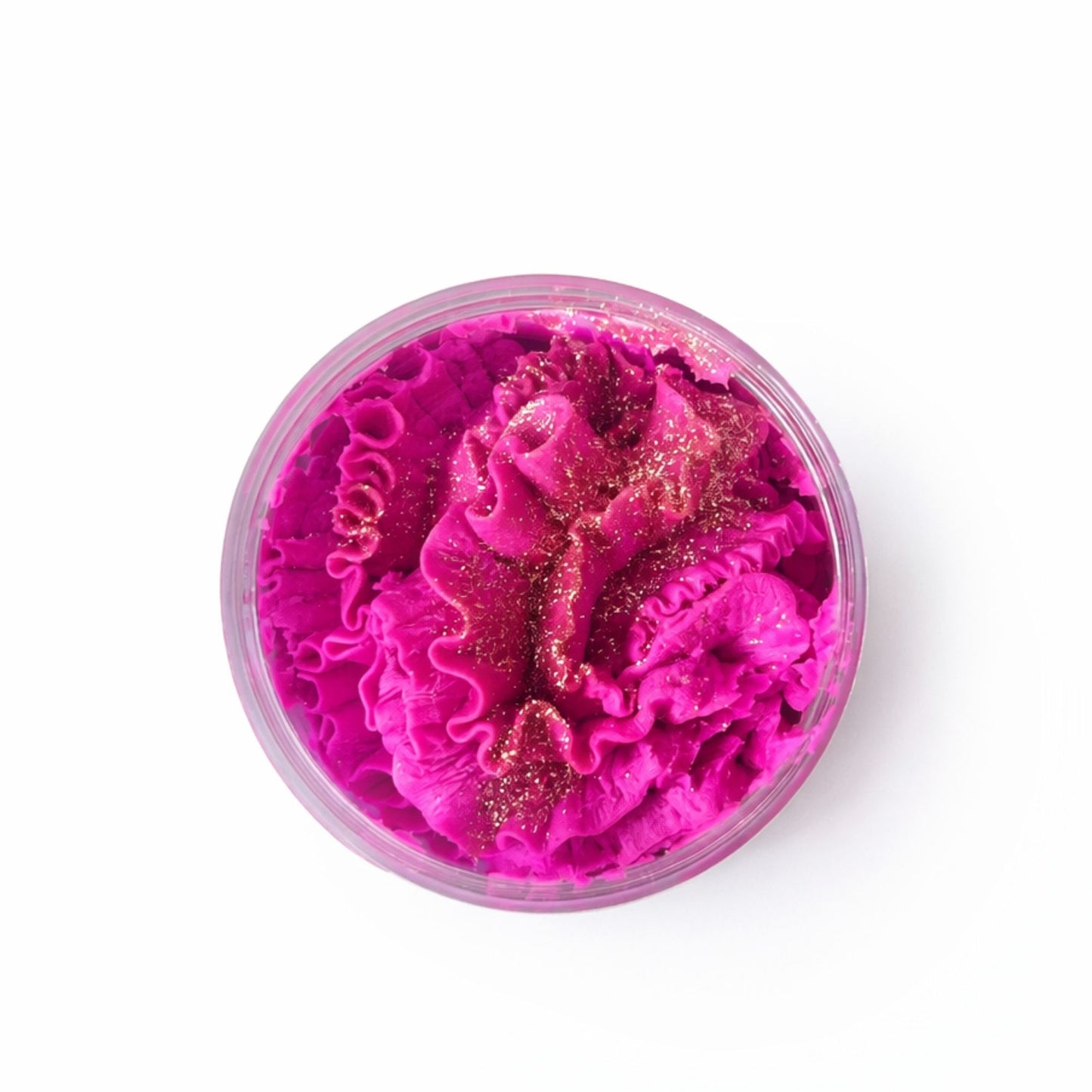 Jabón en forma de flor, color rosa fucsia, con brillo dorado, en envase transparente. Ideal para regalos.