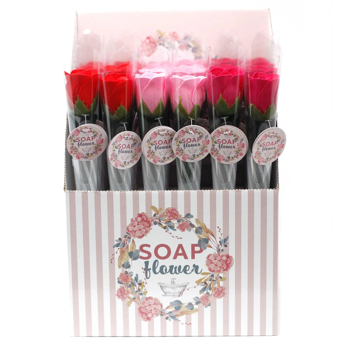 Expositor con rosas de jabón en tonos rojos y rosas, envueltas individualmente en celofán con etiquetas decorativas.