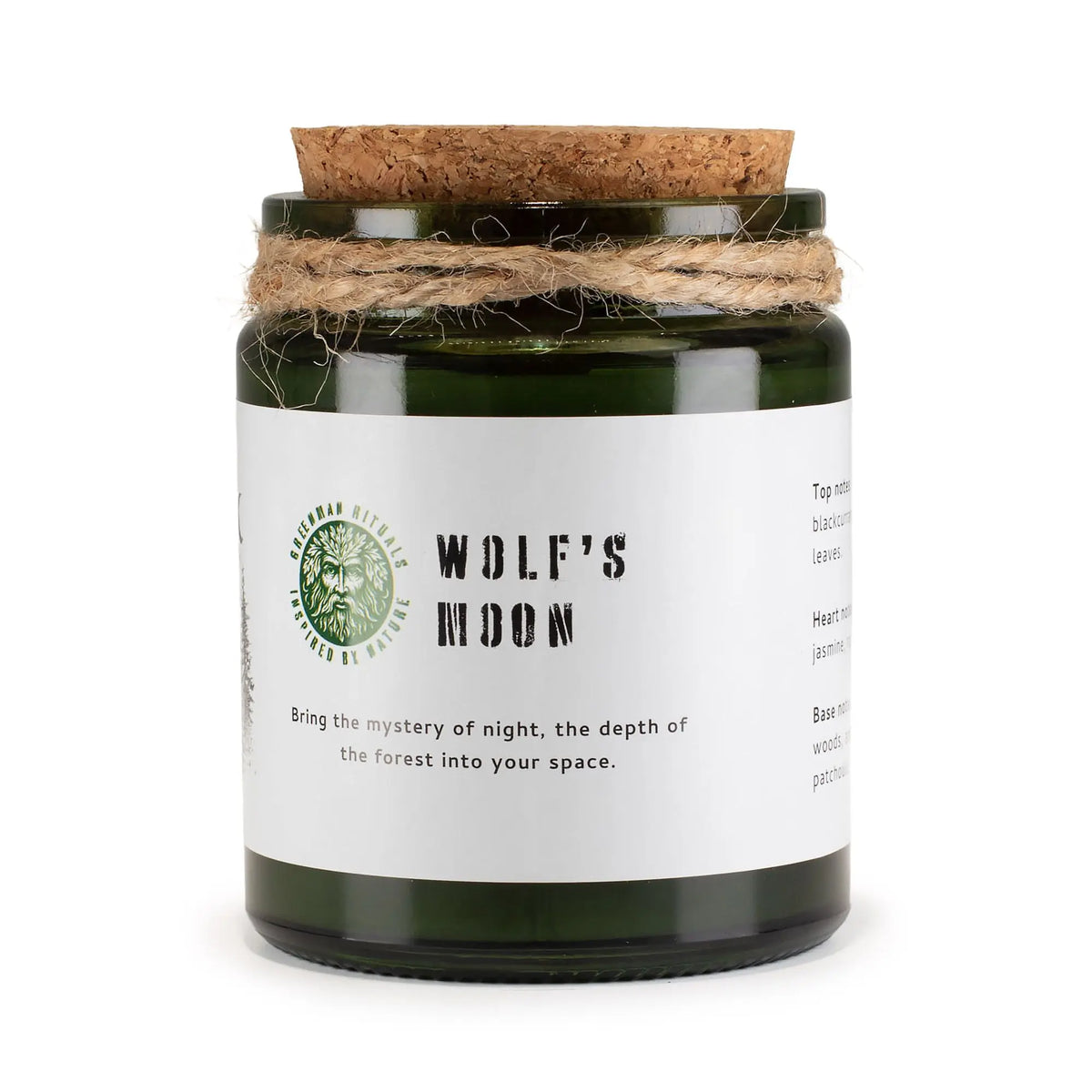 Vela aromática 'Wolf's Moon' en frasco verde, tapón de corcho, con notas de bosque y jazmín. Ideal para ambientar.