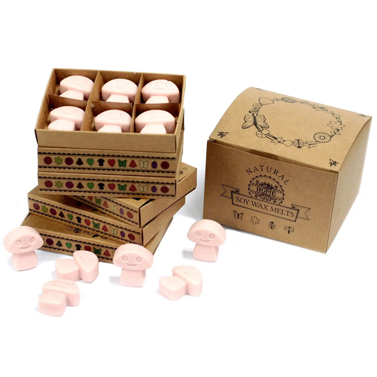Seis ceras de soja rosadas con forma de champiñón en caja de cartón decorada con motivos naturales.