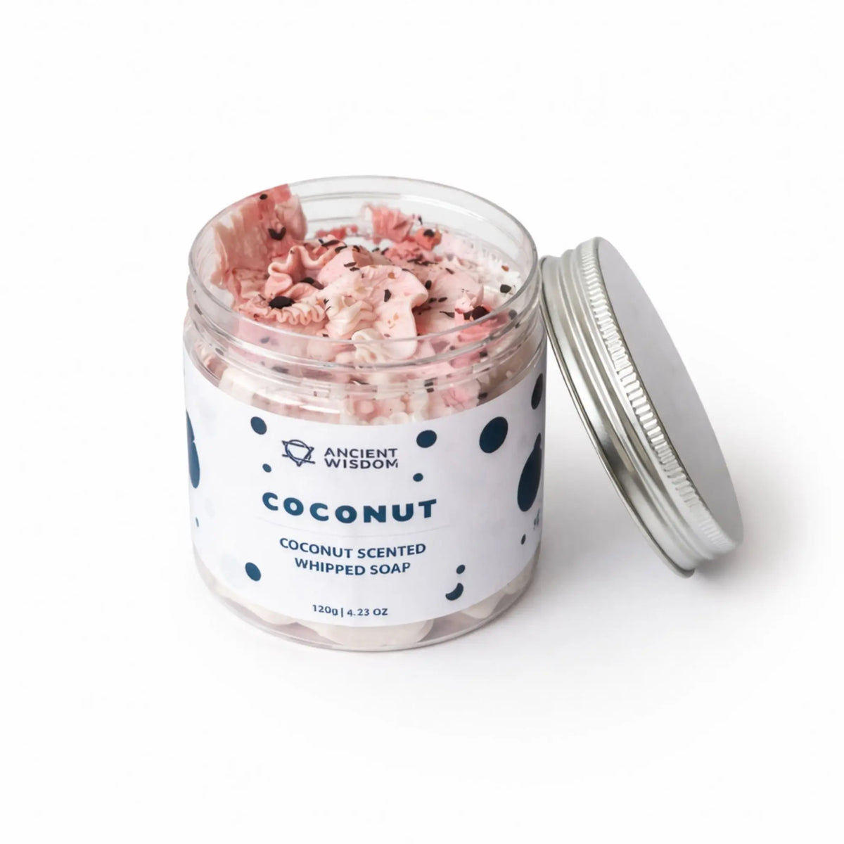 Jabón batido de coco, 120g, en frasco transparente con tapa plateada, aroma fresco y textura cremosa.