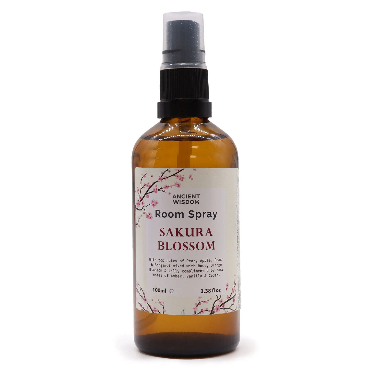Spray de ambiente de 100ml en botella de vidrio ámbar con atomizador negro y etiqueta ilustrada con flores de sakura.