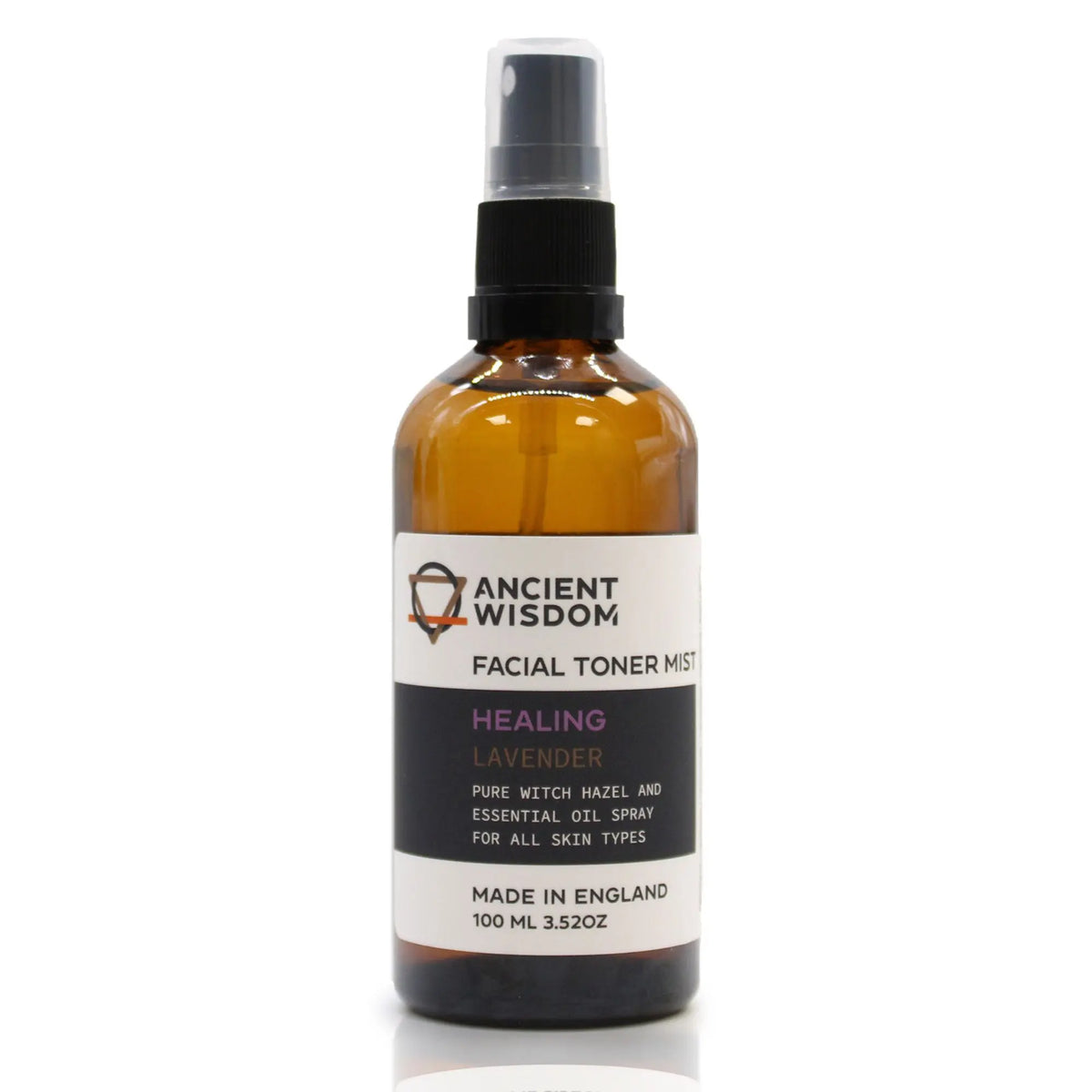Botella de vidrio ámbar de 100ml con pulverizador negro, etiqueta blanca y texto sobre tónico facial de lavanda.