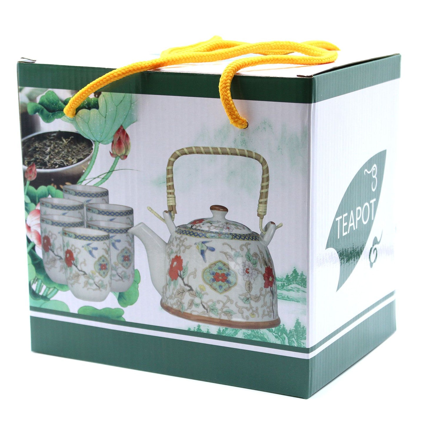 Caja de regalo Ancient Wisdom con tetera de piedra y tazas decoradas con motivos florales y asa de mimbre.