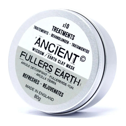 Envase metálico circular con etiqueta blanca y texto negro para mascarilla facial de arcilla tierra de 80g.