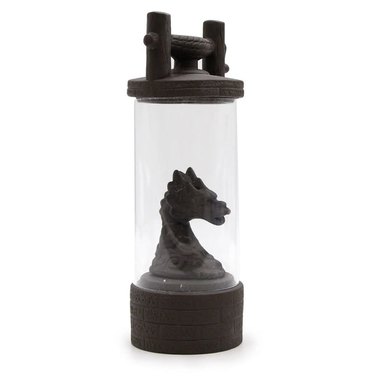 Quemador de incienso de flujo inverso con figura de dragón oscuro en un tubo de cristal sobre base de resina marrón.
