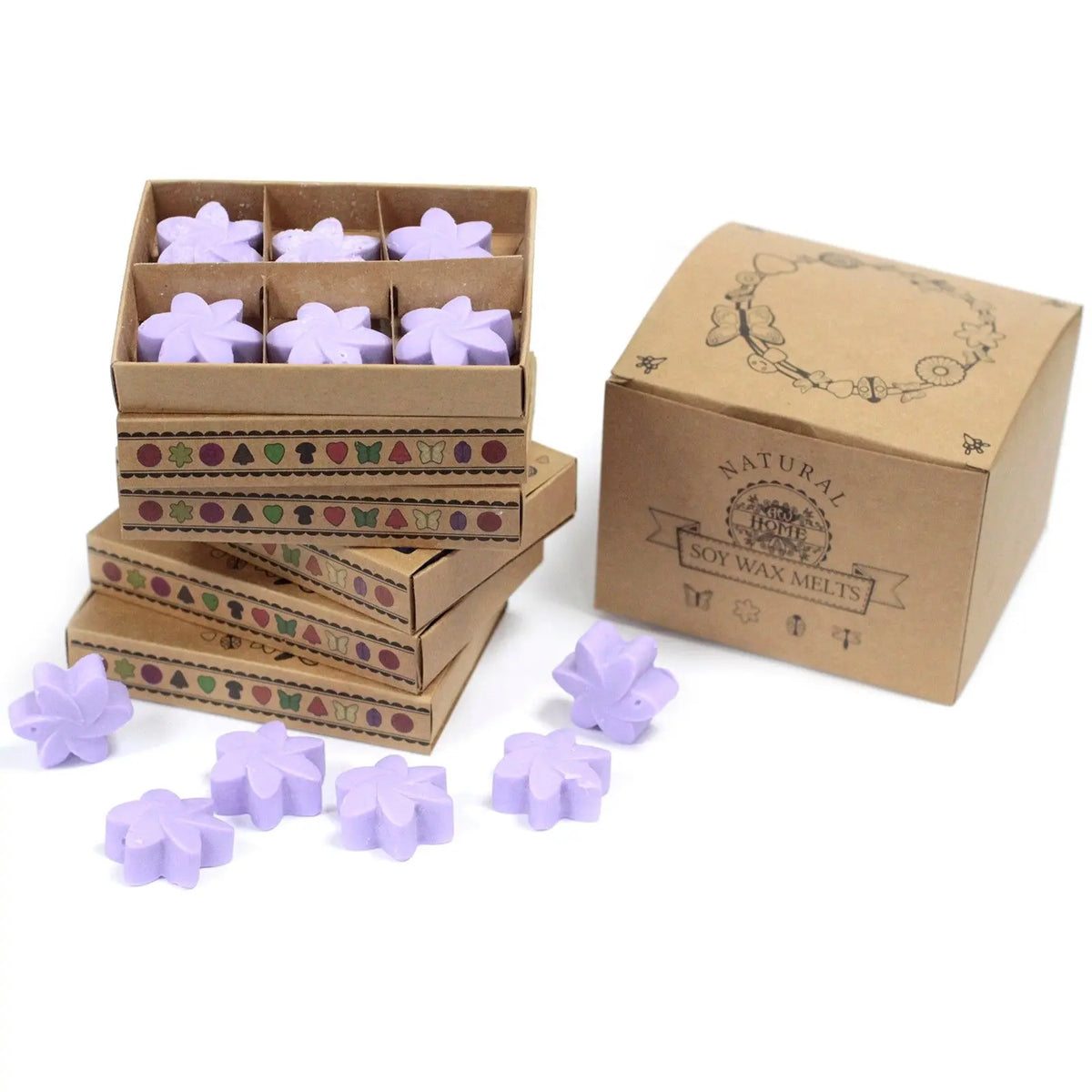 Cajas de cartón con 6 ceras de soja en forma de flor color lavanda y detalles decorativos en el exterior.