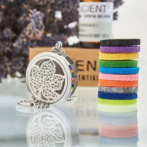Colgante de plata con diseño de flor, incluidos discos de fieltro coloridos para aceites esenciales.
