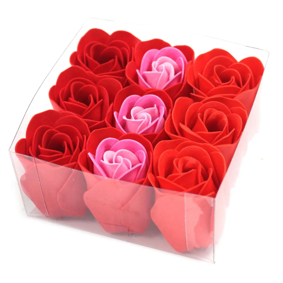 Caja transparente con 9 rosas de jabón: 6 rojas y 3 rosas, dispuestas en cuadrícula sobre fondo blanco.