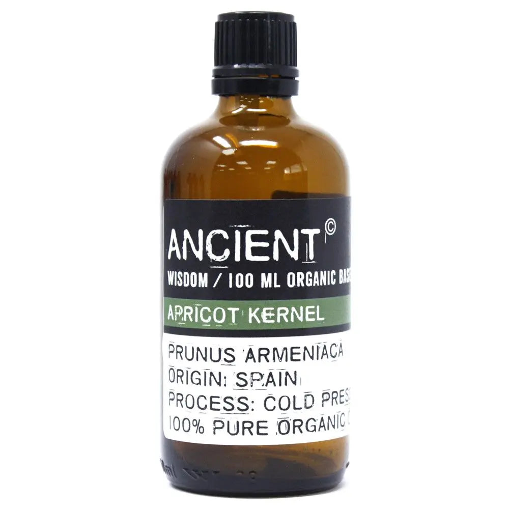 Frasco de vidrio ámbar de 100ml con tapón negro y etiqueta informativa para aceite de hueso de albaricoque orgánico.