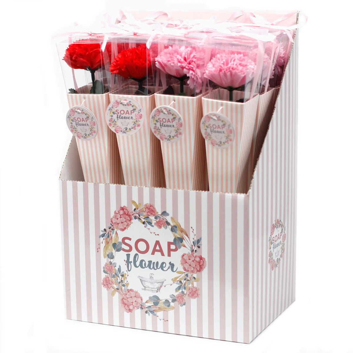 Expositor de cartón con claveles de jabón en tonos rojos y rosas, empaquetados individualmente en cajas alargadas.