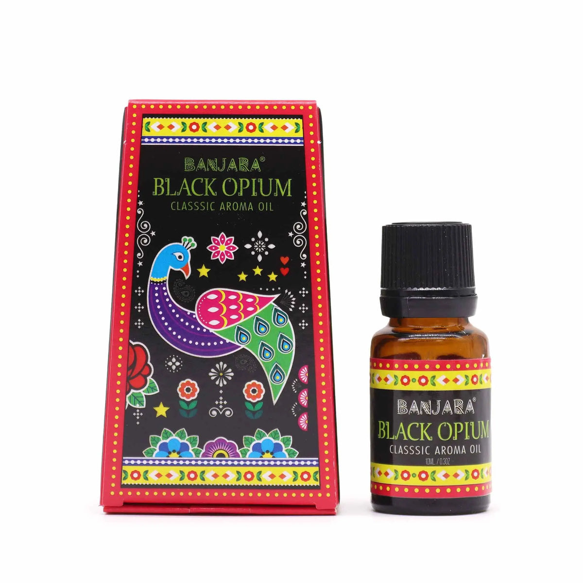 Frasco de aceite aromático y caja decorada con motivos indios coloridos, pavo real y detalles florales sobre fondo negro