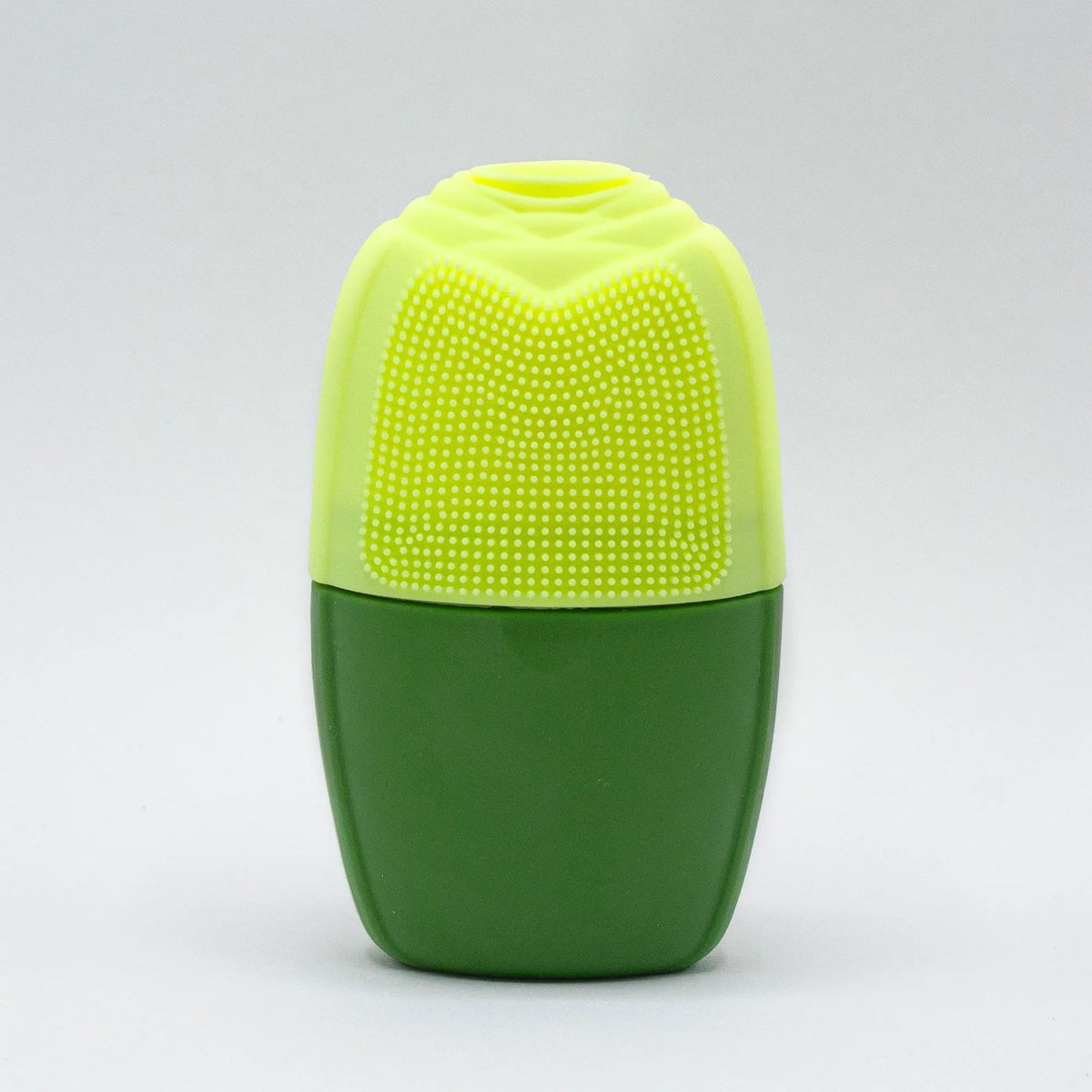 Rodillo de hielo de silicona verde, forma ovalada con superficie superior texturizada para masaje facial.