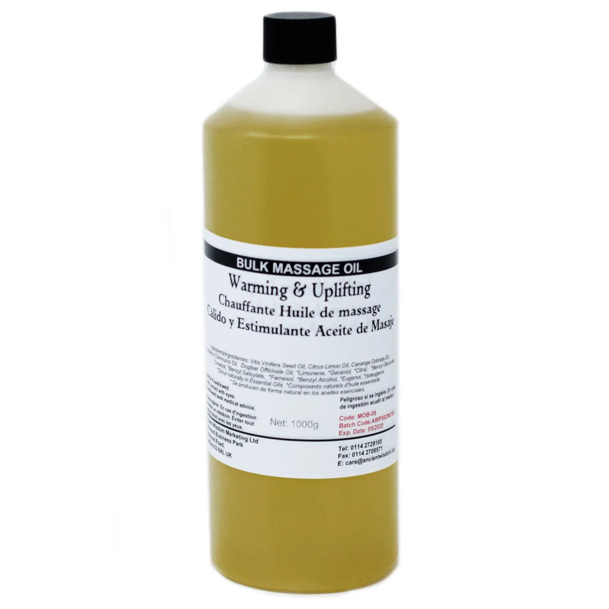 Botella cilíndrica de plástico con 1kg de aceite de masaje dorado. Etiqueta blanca con texto descriptivo sobre fondo.