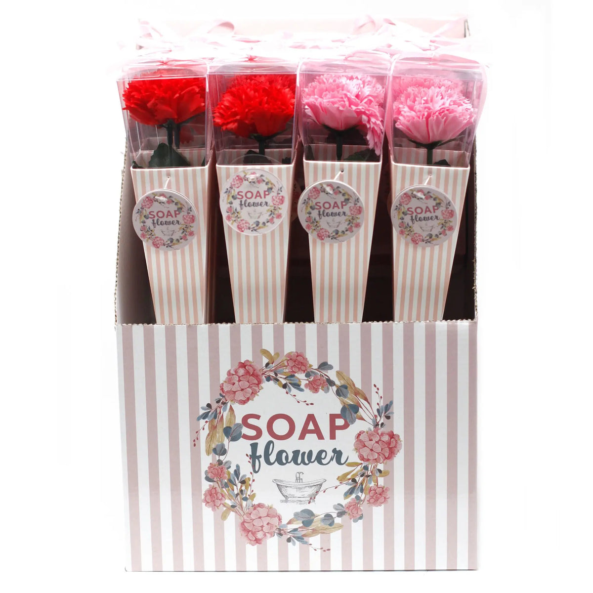 Expositor con claveles de jabón rojos y rosas, en cajas individuales de rayas, listos para regalo.